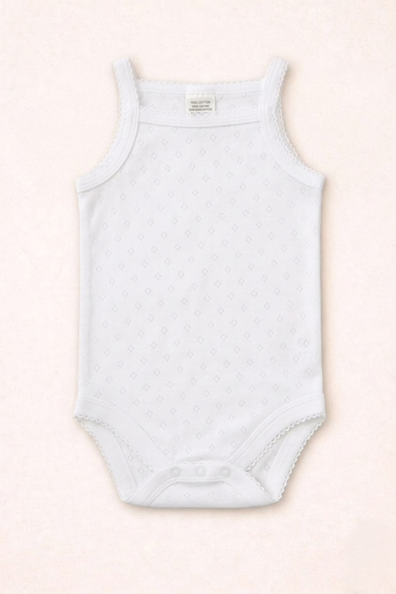 white sleeveless pointelle bodysuit