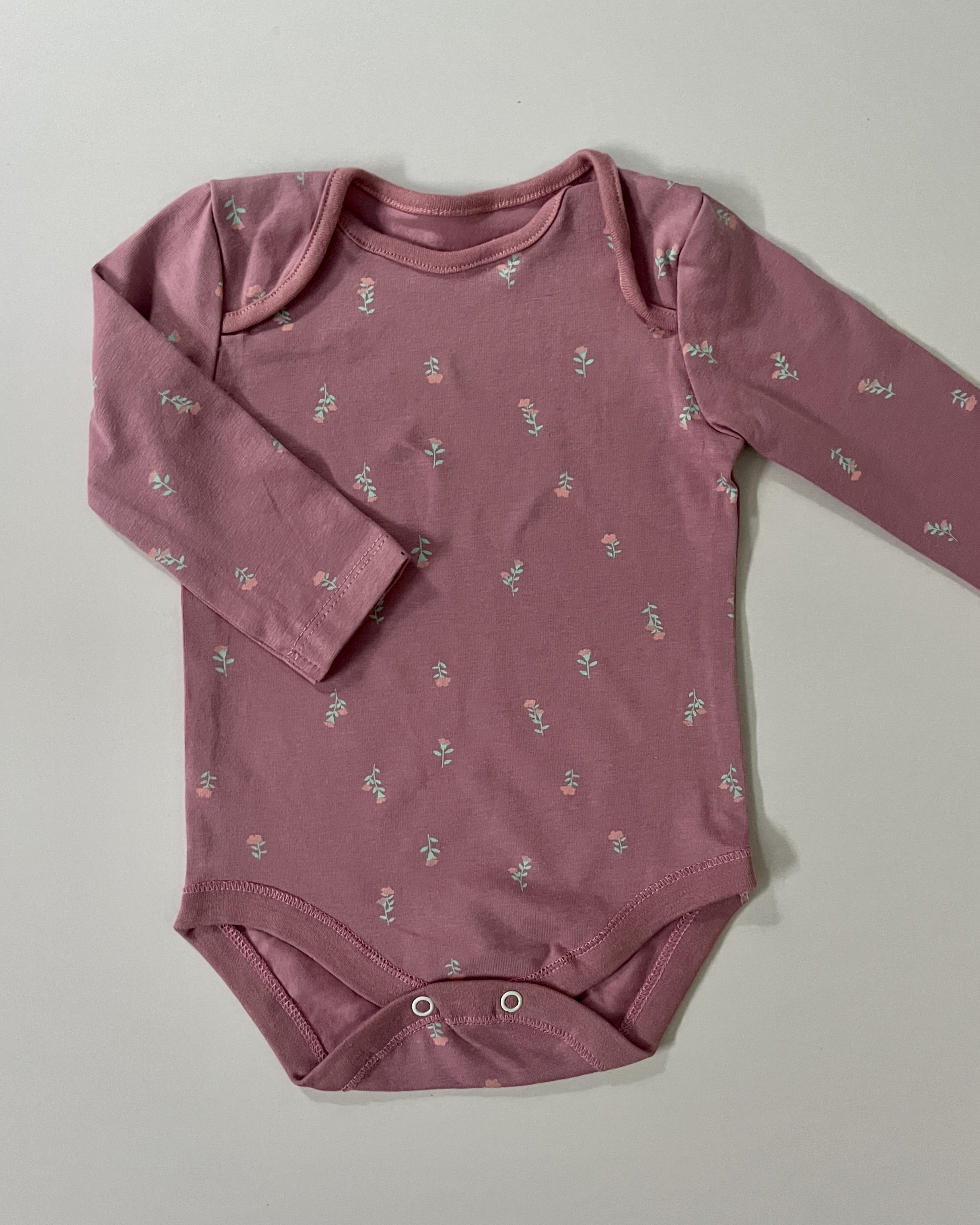 purple floral onsie