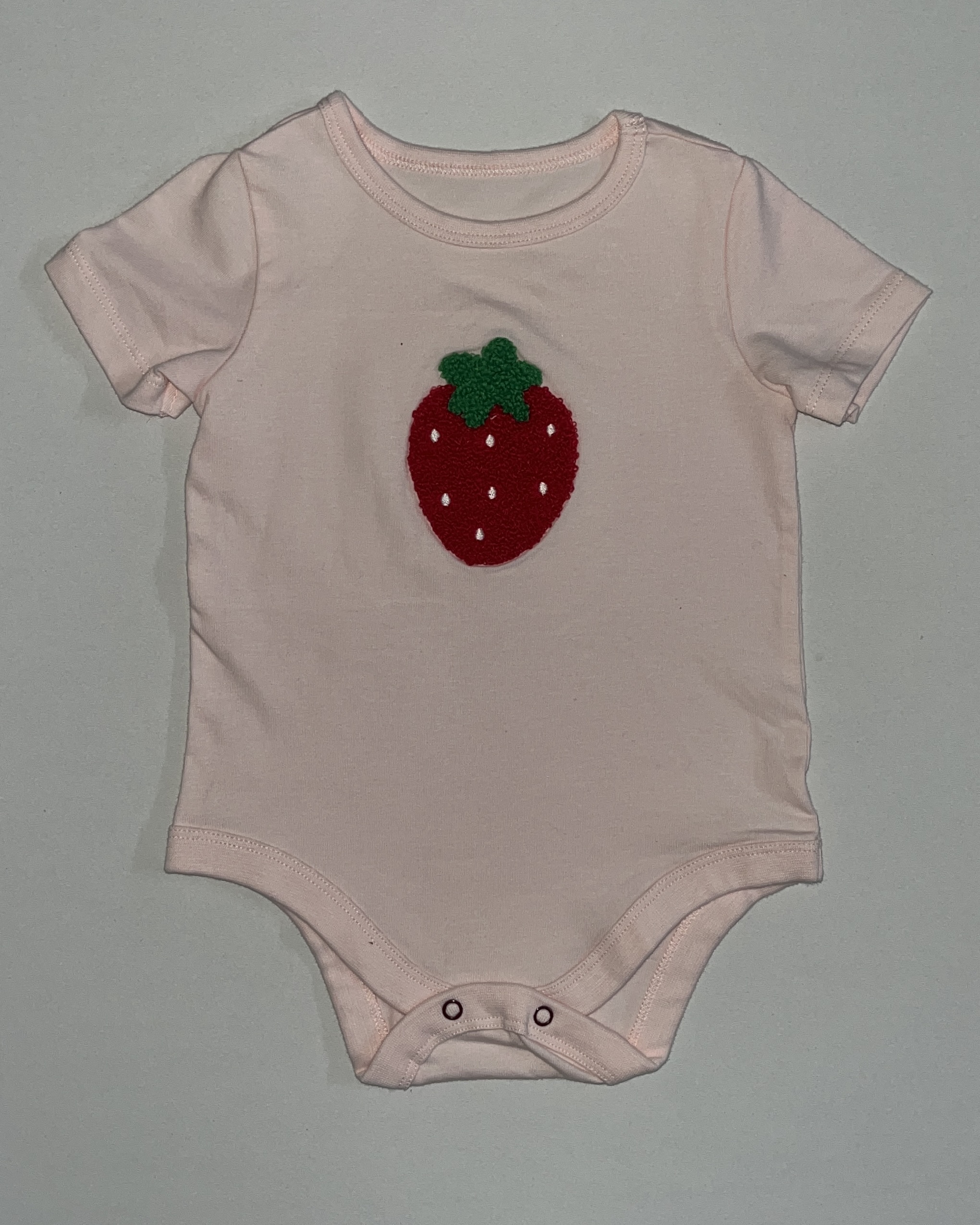 strawberry appliqué onsie